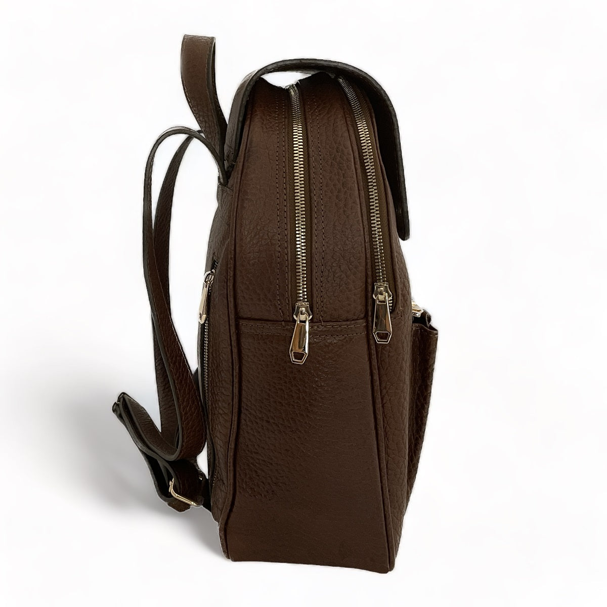 Brown leather backpack — side profile showing slim depth