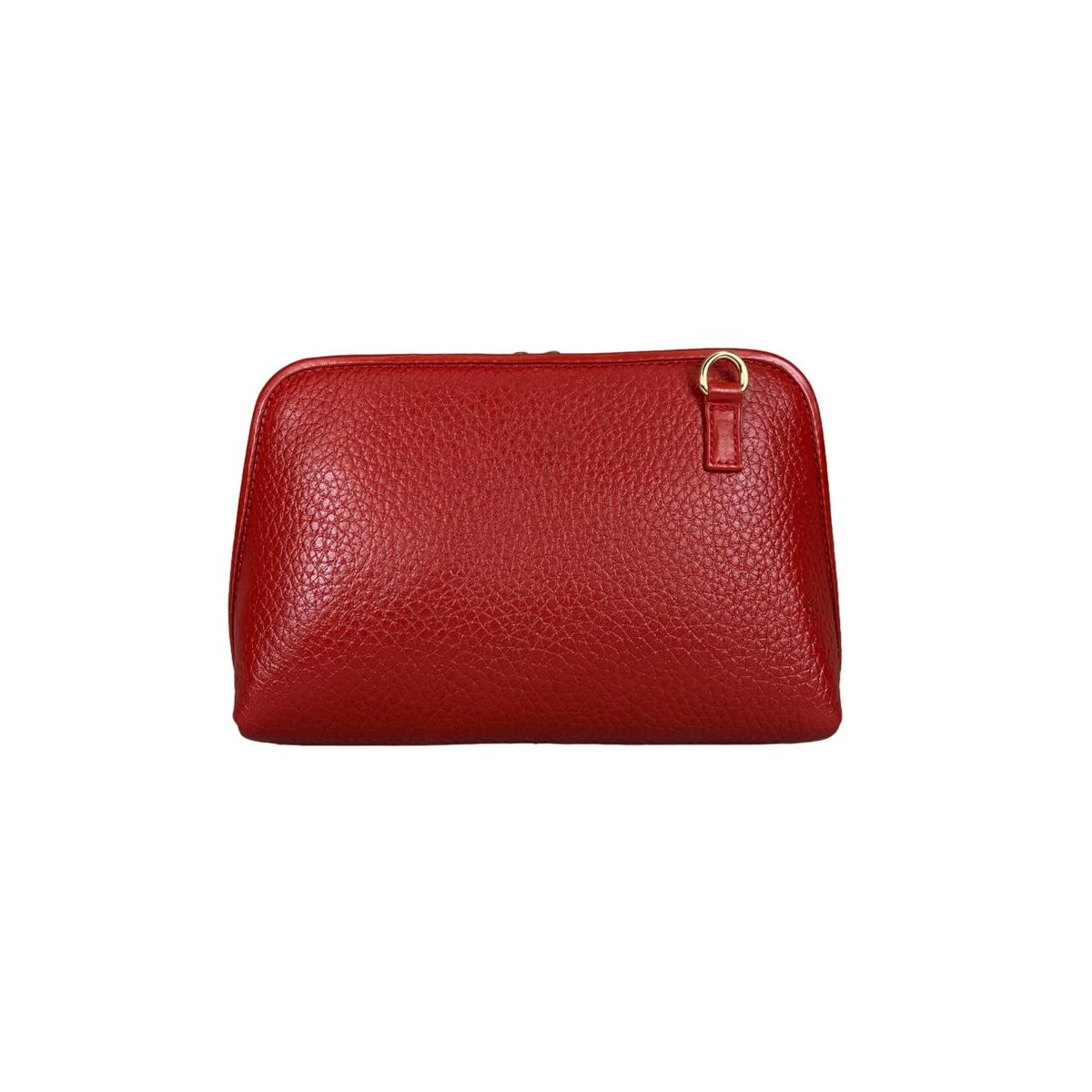 Red leather bag showing adjustable shoulder strap functionality