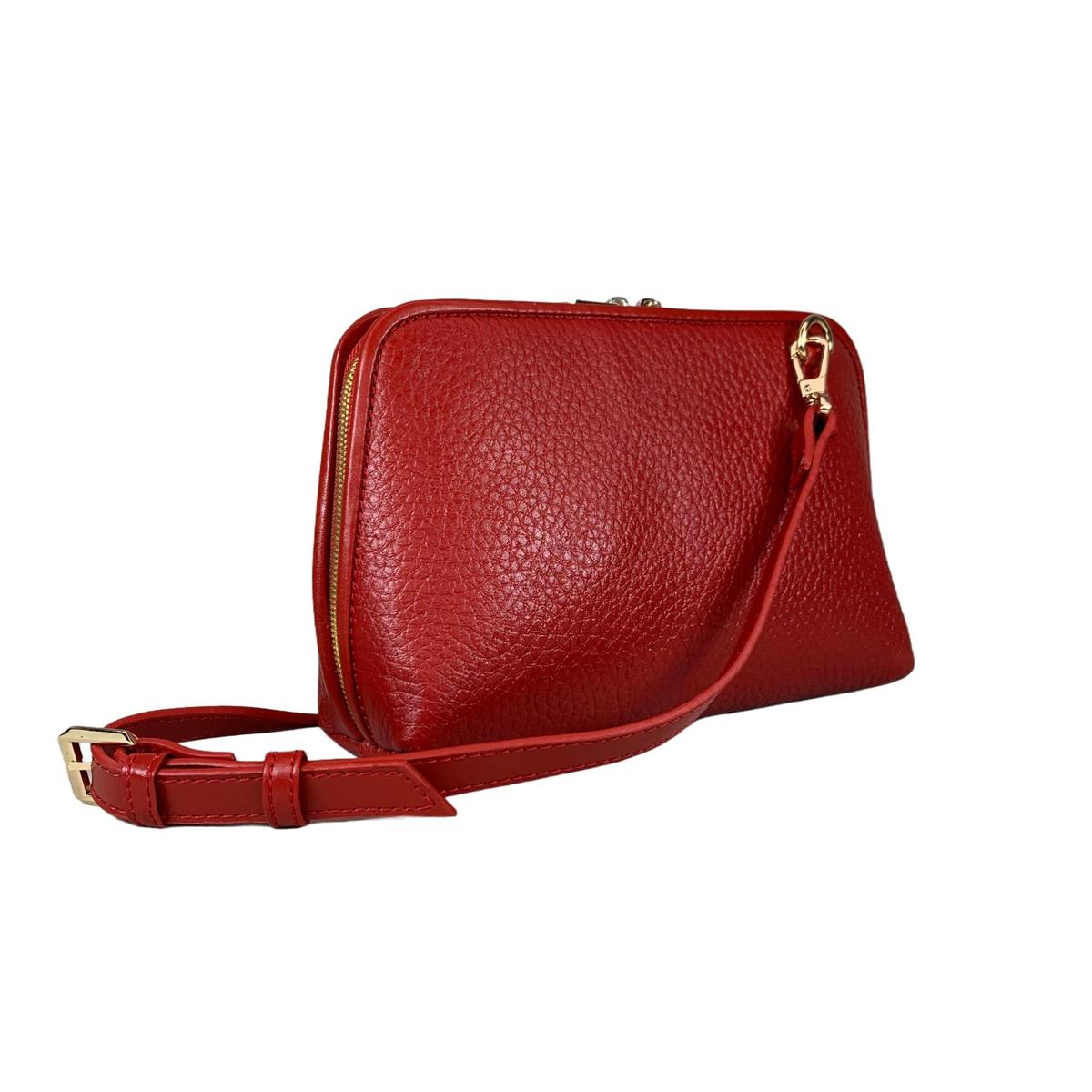 Red leather clutch bag showing versatile carrying options