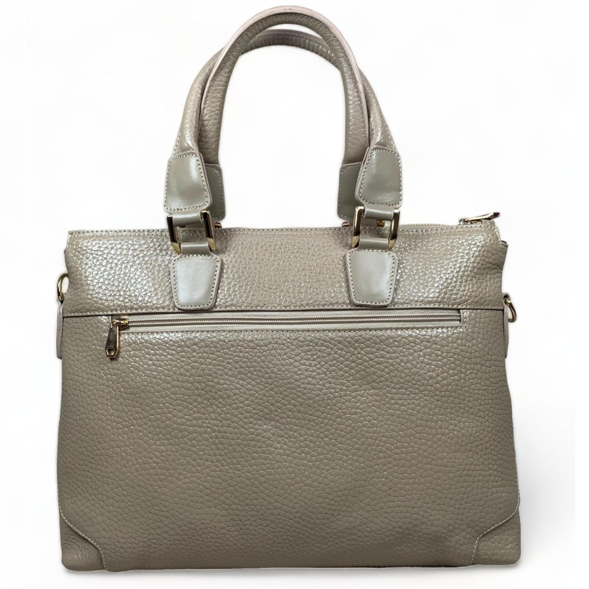 Back view of cream leather laptop bag showing the convenient rear zip pocket