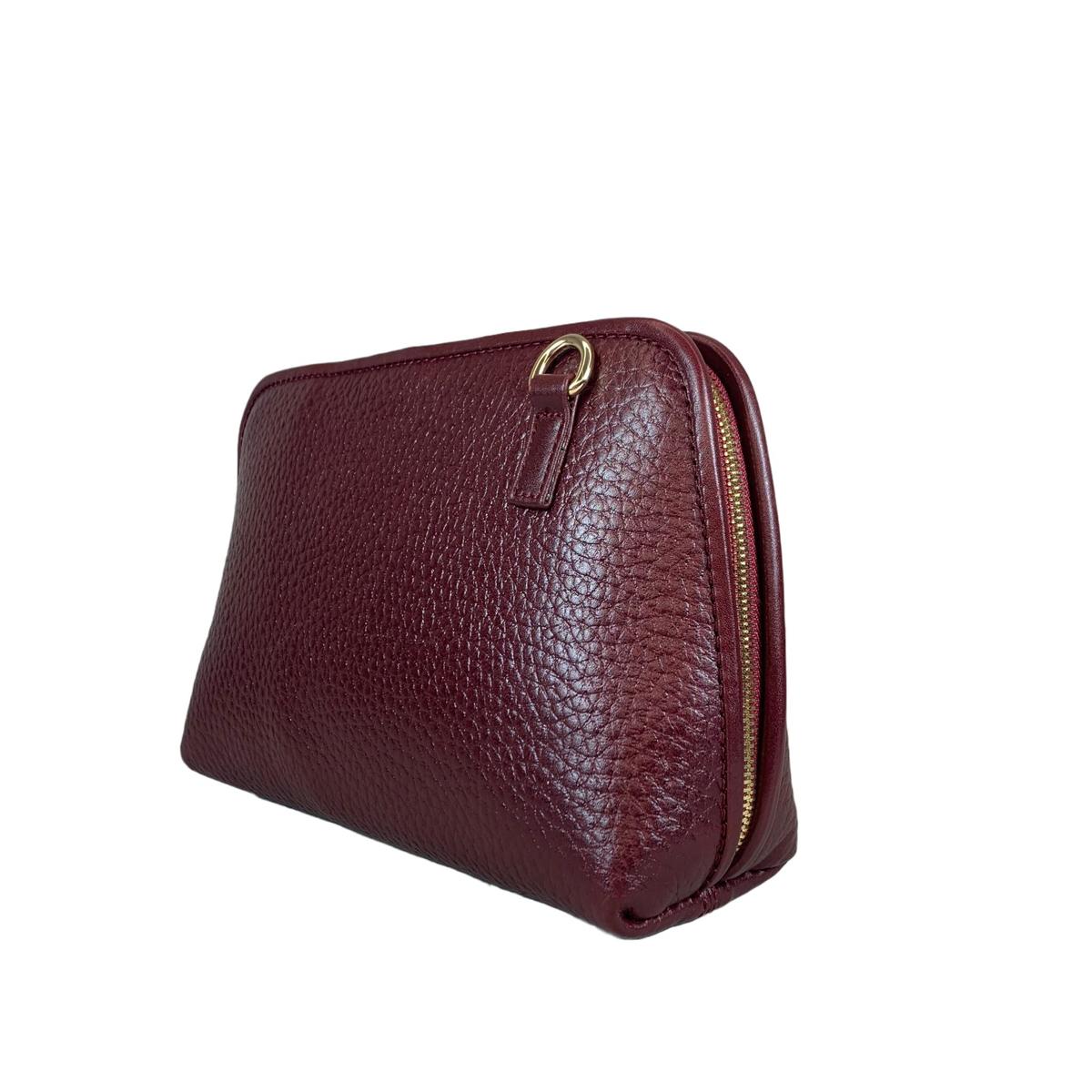 Dark red leather clutch bag size comparison with everyday items