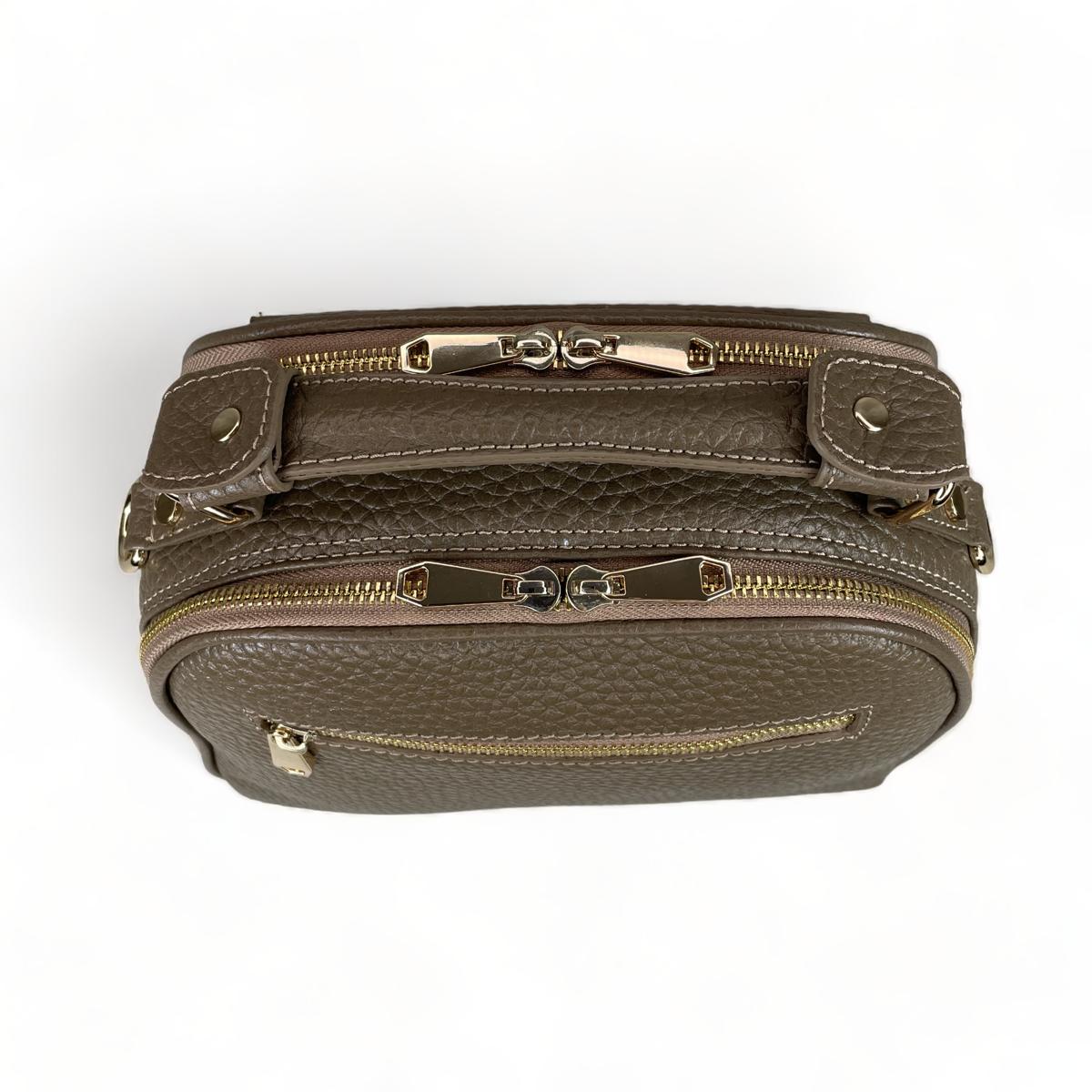 Top handle and detachable crossbody strap, hardware close-up, beige