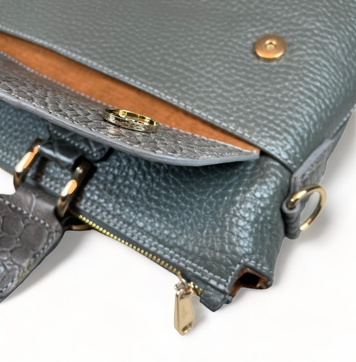 Gray leather laptop bag flat lay showing full dimensions and design