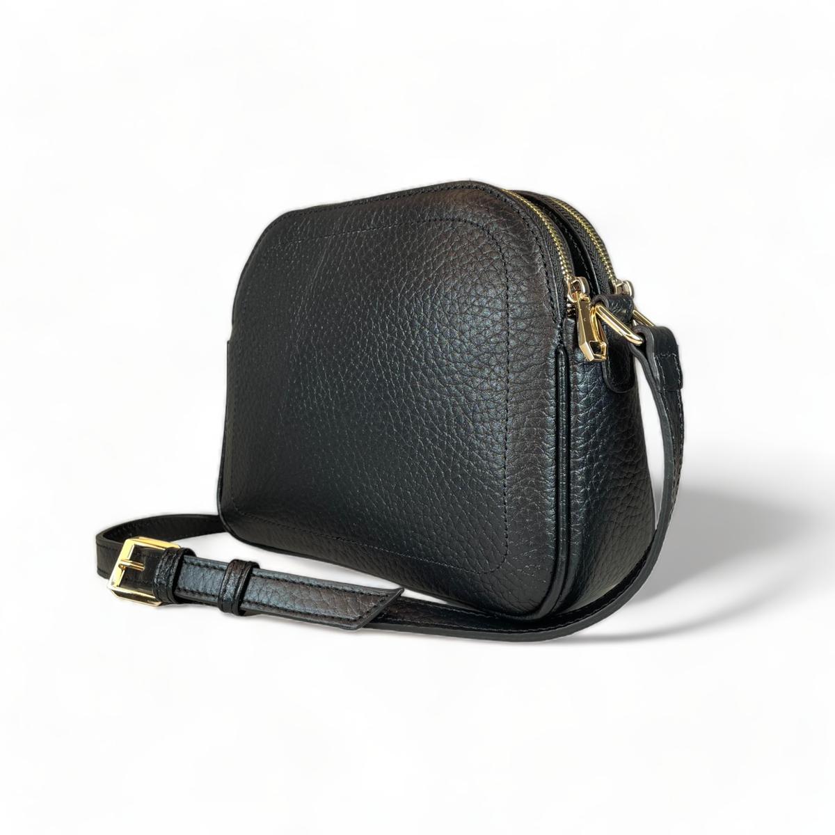 Adjustable strap hardware detail - premium black leather crossbody shoulder bag