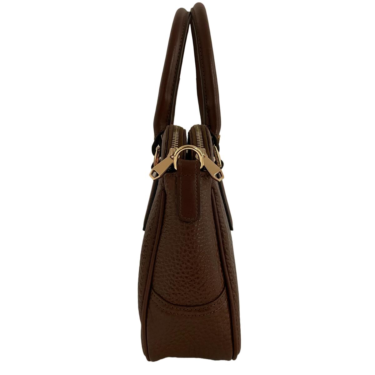 Side profile of brown leather office bag displaying depth and structured design