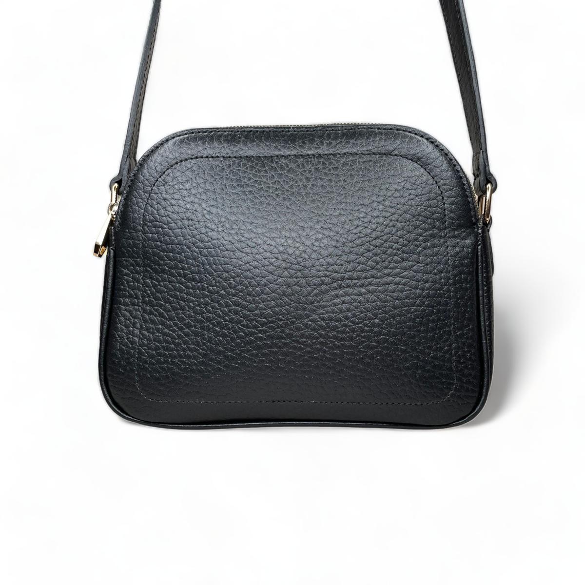 Black leather shoulder bag with adjustable strap, front view