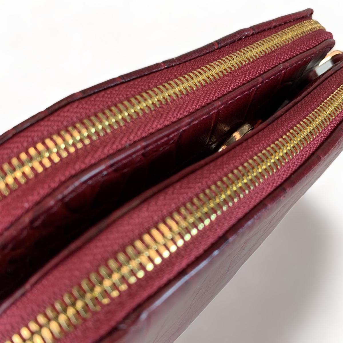 Interior view of women’s leather shoulder bag with multiple compartments