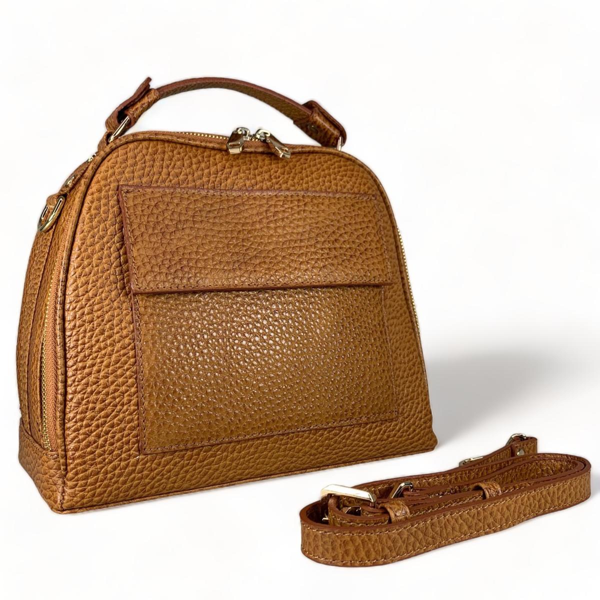 Close-up detail of leather handbag craftsmanship and stitching quality