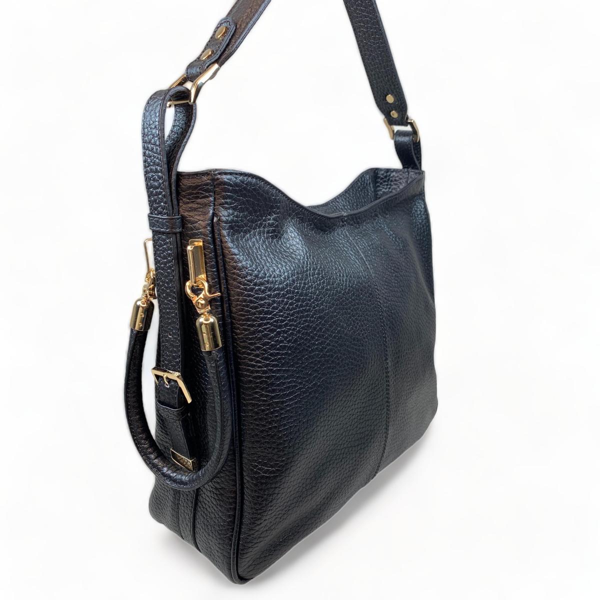 Side profile showing slim silhouette and structured base, black tote