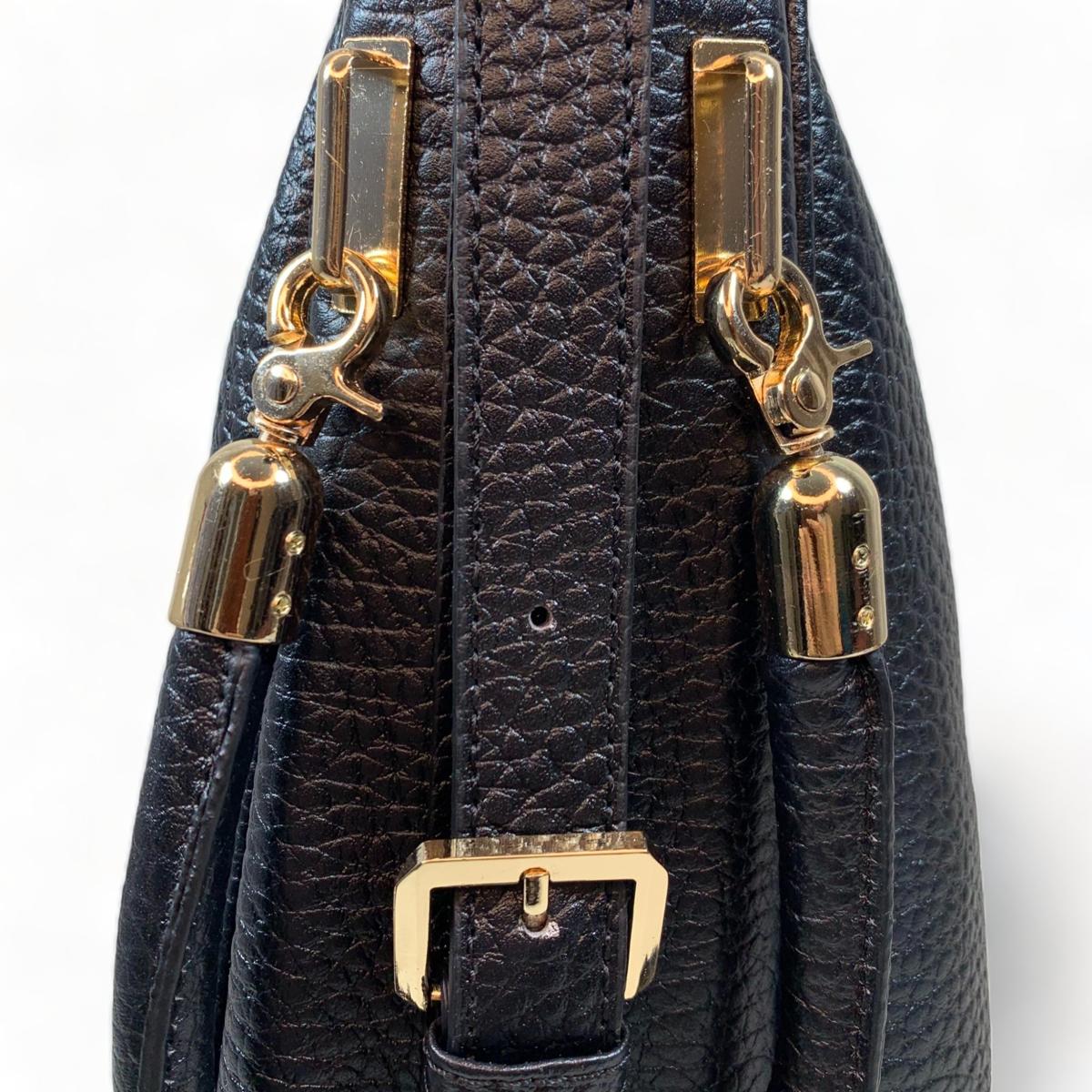 Top view with secure zipper closure and wide opening, black tote