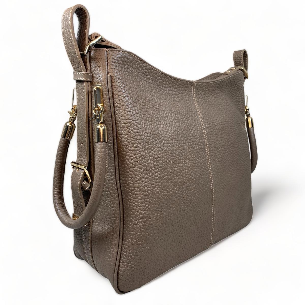 Side view of khaki leather tote bag - displaying structured silhouette and quality construction