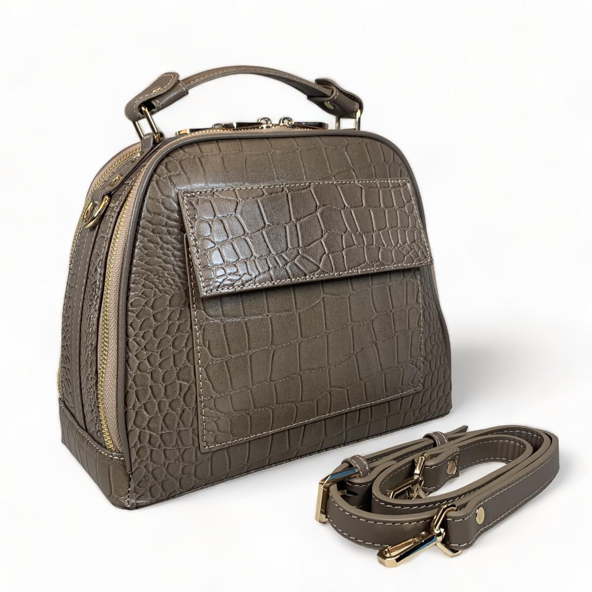 Khaki leather handbag front view showing crocodile texture pattern and dual handles