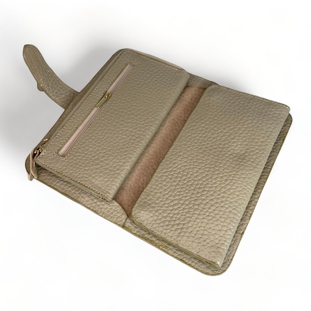 Cream leather clutch — side profile with structured slim silhouette