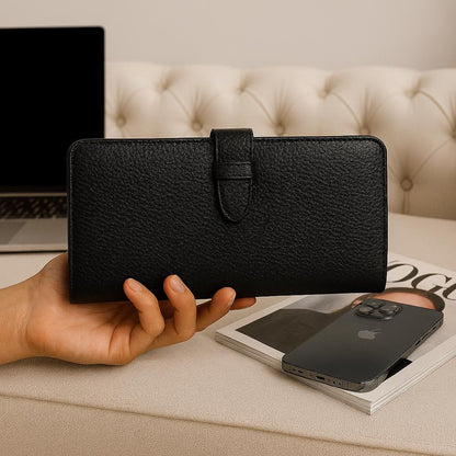LeatherLuxe Wallet-Clutch with Card Holder Full-grain black leather wallet-clutch on a sofa