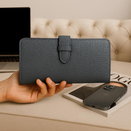 Gray full-grain leather clutch with matching card holder — front view, 22×12×4 cm.